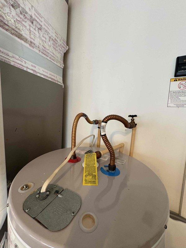 # HVAC Maintenance - Cooling 2 Systems Service Report

Completed comprehensive preventive maintenance service on dual cooling systems as part of scheduled Cool Check program. Performed thorough inspection of both HVAC units including refrigerant level verification, electrical component testing, and condensate drain line evaluation. All systems found to be operating within manufacturer specifications with no immediate service requirements identified.

During the inspection, documented existing plumbing and mechanical equipment configuration including water heater connections and associated copper and PVC piping systems. Photographed equipment layout for service records. Customer provided onsite payment approval for service call. Maintenance agreement renewal attachment scheduled for future date, with next preventive maintenance visit programmed into service schedule for March 2026.