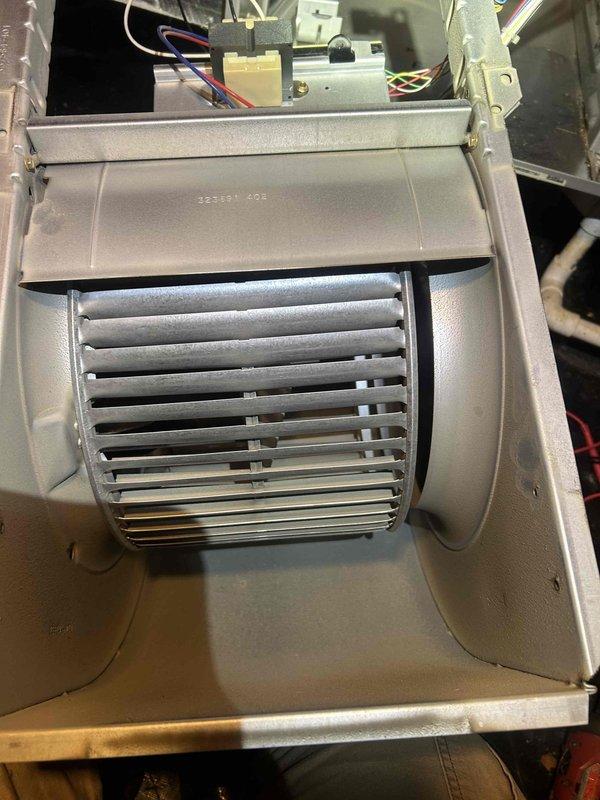 Responded to no heat call with reported unusual odor in master bedroom. Upon inspection, accessed blower assembly and found system not responding to thermostat calls for heat. Inspected blower motor, control board wiring connections, and internal components for potential electrical issues or overheating that could cause odor. Verified blower wheel condition and checked for debris or obstructions that may prevent proper operation or create burning smell when heat cycle initiated.