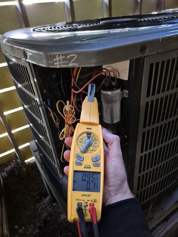 Performed preventive maintenance on outdoor condensing unit #2 as part of a two-system cooling maintenance service. Conducted electrical diagnostics using digital multimeter to verify system performance, measuring voltage and amperage at key components. Inspected and tested dual-run capacitor, contactor, and associated electrical connections. Verified proper wiring connections and terminal integrity throughout the control circuit. All electrical components tested within normal operating parameters. Unit operational and ready for cooling season.