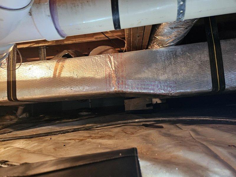 Conducted comprehensive assessment of existing ductwork system in crawl space following resolution of rodent infestation. Inspected flexible ductwork runs, insulation wrapping integrity, and support structures throughout underfloor area. Provided detailed estimate for complete ductwork replacement to restore proper HVAC system performance and ensure code-compliant installation with adequate support and sealed connections.
