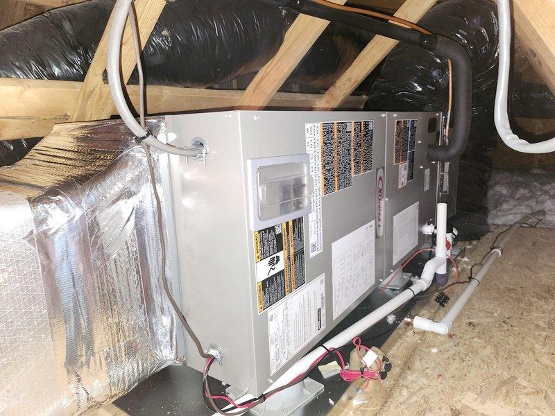 Completed full HVAC system replacement including removal and disposal of existing equipment. Installed Lennox ML14KP1-018 1.5-ton 14 SEER heat pump on pressure-treated wood platform with new outdoor disconnect and electrical whip. Mounted Lennox CBK45UHET-024 air handler in attic space with 10kW electric heat pack. Fabricated and installed metal duct transitions to adapt new equipment to existing ductwork. Reused existing condensate drain lines and refrigerant line sets where applicable. Replaced deteriorated armaflex insulation on refrigerant lines. Installed Honeywell TH6320WF digital WiFi thermostat for system control. Verified all electrical connections, tested system operation, and confirmed proper airflow throughout. System commissioned and left in full working order.