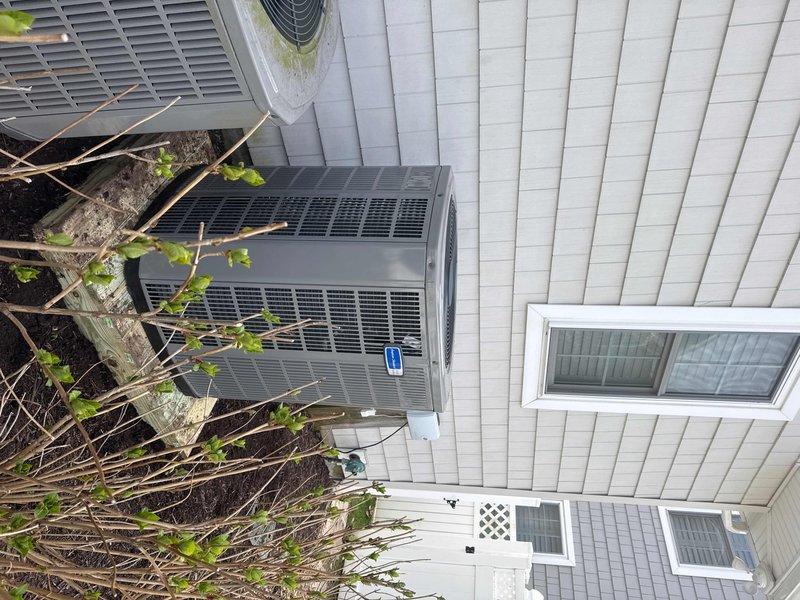 Removed and disposed of existing second floor HVAC system. Installed new 2-ton 17 SEER heat pump outdoor unit on platform with 5A6H7024 condenser and 5TEM6B02 variable speed fan coil unit in drain pan with shut-off valve. Installed 10KW electric heat strip with breaker (HTR1510BRKR) for supplemental heating. Flushed, pressure tested, and recharged refrigeration lines to manufacturer specifications. Furnished and installed electrical whip with disconnect for outdoor unit. Installed TH6320WF2003 WiFi programmable thermostat for remote system control and monitoring. Extended maintenance contract coverage by one year on both systems in residence. All equipment tested and operational upon completion.