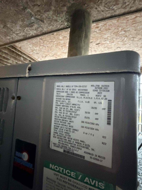 Conducted on-site assessment for dual fuel system replacement serving multi-floor residential property. Evaluated existing equipment including two heat pumps and two air handlers located in outside mechanical room on first floor and second-floor laundry room, with systems serving second and third-floor rental units. Documented current equipment specifications and configurations through photographic documentation of air handler unit in attic space and existing Honeywell thermostat control. Prepared comprehensive estimate for complete dual fuel system replacement to address heating and cooling needs for multiple zones.