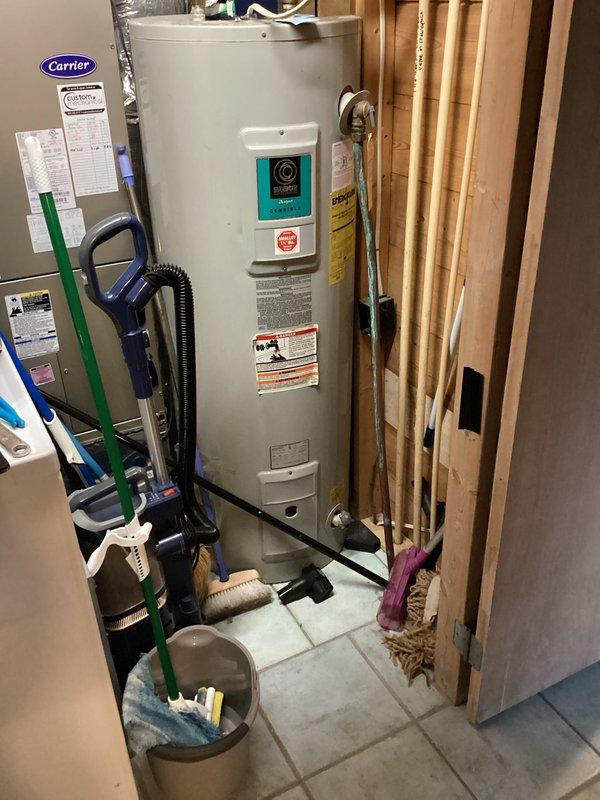 Completed de-winterization service for residential property. Restored electrical power and heating system, set thermostat to 50 degrees, and activated refrigerator. Inspected water heater, plumbing distribution system with multiple zone valves, and verified all connections were secure and operational for seasonal occupancy.