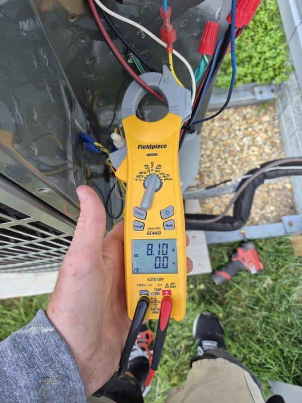 Performed routine cooling maintenance visit on residential HVAC system. Conducted electrical diagnostics using clamp meter to verify amperage draws and system performance at outdoor condensing unit. All electrical readings were within normal operating parameters, and unit was operating efficiently with no issues identified.