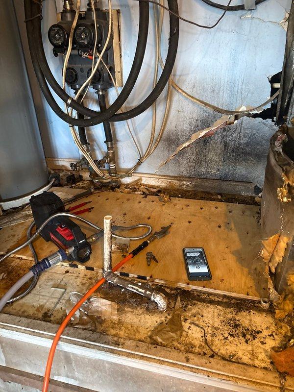 Successfully removed geothermal package unit from garage closet to facilitate customer's renovation project. All refrigerant lines, water lines, and electrical connections were properly disconnected, capped, and sealed to prevent contamination and ensure safe conditions during construction phase.