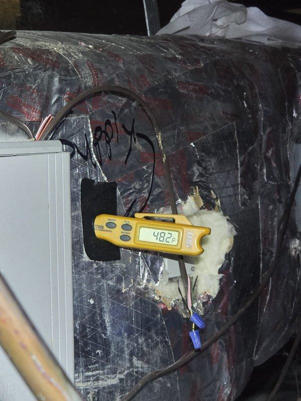 Completed routine cooling maintenance visit on HVAC system. Performed diagnostic testing of ductwork and air handler unit using digital measuring instruments, recording system readings of 482.2. Inspected insulated ductwork and air handler components in attic space, checking for proper operation and any potential issues. All measurements and system parameters were within acceptable ranges for continued operation.