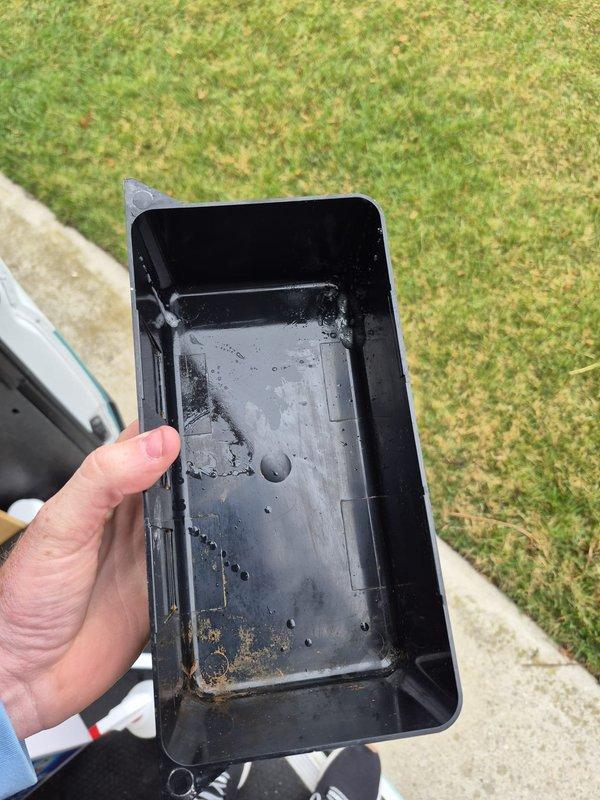 Completed routine cooling maintenance visit on HVAC system. Inspected and removed heavily corroded condensate drain pan showing extensive rust damage and deterioration from prolonged water exposure. Replaced failed drain pan with new component, cleaned and flushed drain line to ensure proper condensate removal. Verified all electrical connections, inspected blower motor assembly, and confirmed system operational status upon completion.