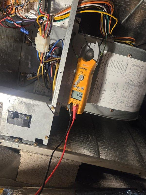 Completed scheduled preventive maintenance tune-up on HVAC system. Performed temperature diagnostics measuring supply air at 43.3°F and conducted electrical system testing showing 10.8V at control circuit. Inspected all wire connections, insulation integrity, and internal components with system operating within normal parameters.