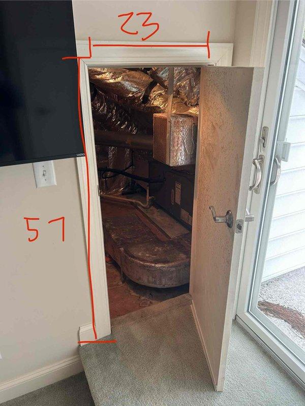 Responded to no heat call for upstairs HVAC system experiencing extended run times to reach setpoint. Upon inspection, found evaporator coil compartment with significant rust deterioration on back panel and drain pan, indicating long-term moisture exposure. System located in confined 23" x 51" closet space with compressed ductwork configuration. Evaluated airflow restrictions and verified system operation. Unit showing signs of age-related corrosion but currently operational with reduced efficiency due to extended heating cycles.