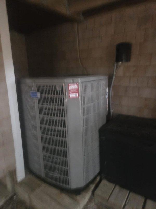 Completed full HVAC system replacement including removal and disposal of existing equipment. Installed 3.5-ton 14 SEER heat pump outdoor unit with InfiniGuard anti-corrosive coating on existing platform, complete with whip and disconnect. Installed variable speed fan coil unit indoors with 15KW electric heater and breaker, along with 1-inch filter rack. Flushed, pressure tested, and recharged refrigeration lines with R454B refrigerant, verifying proper superheat and subcool readings. Installed Honeywell TH6320WF WiFi thermostat for system control and remote monitoring capabilities. All equipment tested and operational upon completion.