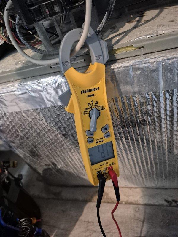 Performed comprehensive tune-up and inspection on residential HVAC system. Used clamp meter to verify electrical parameters including amperage draws and voltage readings at both the outdoor condensing unit and indoor air handler, confirming all measurements within manufacturer specifications. All system components operating properly with no deficiencies noted.