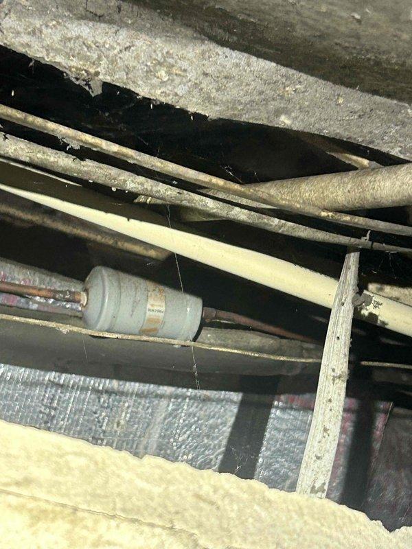 Responded to no heat call on gas furnace system less than 10 years old. Upon arrival, performed comprehensive combustion analysis using calibrated digital analyzer. Testing revealed elevated carbon monoxide levels at 753 ppm in flue gases, which exceeds safe operational parameters. Oxygen reading measured 8.1%, efficiency at 94.6%, CO2 at 7.2%, and stack temperature at 104°F. Inspected heat exchanger and venting system in attic space, documenting condition of furnace components, ductwork, and associated piping. Identified potential heat exchanger integrity issue or incomplete combustion problem contributing to dangerous CO levels. Advised immediate system shutdown due to safety concerns until proper repairs can be completed. Documented all findings with diagnostic equipment readings and photographic evidence of system components for follow-up service recommendations.