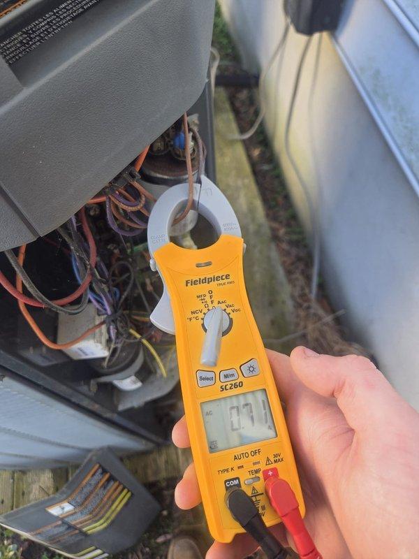 Performed routine maintenance on two cooling systems. Conducted electrical diagnostics using clamp meter to verify amperage readings on both units, confirming proper current draw on compressor and blower circuits. All electrical components tested within manufacturer specifications, and both systems operating normally at time of service.
