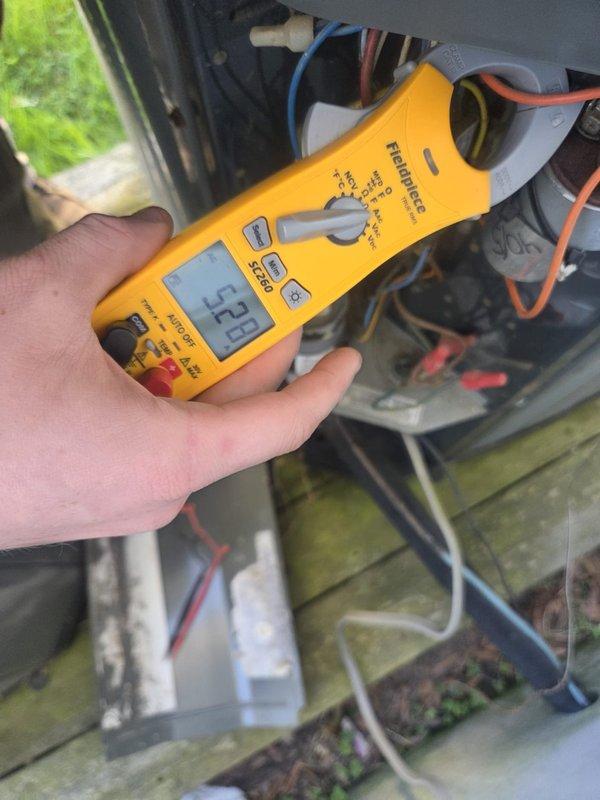 Performed routine maintenance on two cooling systems. Conducted electrical diagnostics using clamp meter to verify amperage readings on both units, confirming proper current draw on compressor and blower circuits. All electrical components tested within manufacturer specifications, and both systems operating normally at time of service.
