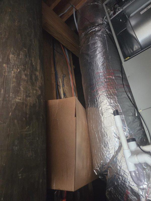 Removed and disposed of existing first floor HVAC system from elevator machine room. Installed 5A6H4030 2.5 ton heat pump outdoor unit on existing concrete platform and applied Infiniguard salt air protective coating to exterior surfaces. Installed electrical whip and disconnect for outdoor unit. Mounted 5TEM6B03 variable speed fan coil unit with BAYHTR1510 10KW electric heater and breaker in attic space. Flushed, pressure tested, and recharged existing refrigeration lines to verify system integrity and proper refrigerant charge. Installed TH6320WF WiFi-enabled programmable thermostat for remote temperature control and monitoring. Verified all electrical connections, tested system operation in heating and cooling modes, and confirmed proper airflow through ductwork. Extended maintenance contract coverage for one additional year on all three systems in residence.