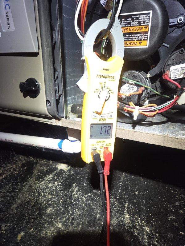 Completed routine cooling maintenance visit on residential HVAC system. Performed electrical diagnostics on outdoor condensing unit, measuring compressor amperage at 1.72 amps using clamp meter to verify proper operation. Inspected supply ductwork in attic space and recorded supply air temperature of 63.8°F to confirm adequate cooling performance. All system components operating within normal parameters with no deficiencies noted.