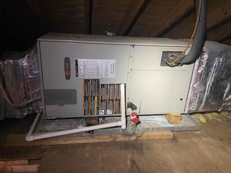 Completed routine cooling maintenance visit on attic-installed HVAC system. Accessed unit via folding attic ladder, performed standard cooling season inspection including filter check, condensate drain line verification, and visual inspection of ductwork and insulation. System operational and ready for cooling season.