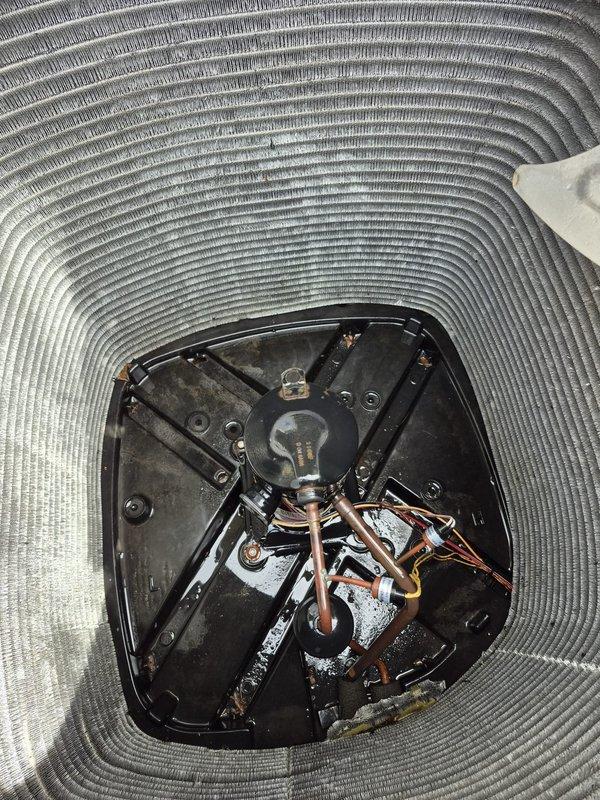 Performed cooling system maintenance and inspection on residential HVAC unit. Replaced heavily soiled air filter that showed significant dust and debris accumulation, which was restricting airflow and reducing system efficiency. Inspected internal components including compressor assembly, refrigerant lines, and electrical connections through access panel—all components found to be in proper working condition with no immediate service needs identified.