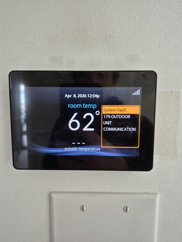 Responded to no cooling call with thermostat displaying fault code 179 indicating outdoor unit communication failure. Upon arrival, found system unable to communicate between indoor and outdoor units, with room temperature at 62°F. Investigated communication error and discovered heavily clogged air filter restricting airflow, likely due to ongoing drywall work at property. Replaced dirty filter with new filter, which restored proper system communication and resolved fault code. Advised homeowner that construction dust and debris can quickly clog filters during renovation work and recommended more frequent filter changes until drywall work is completed to prevent future communication errors and system shutdowns.