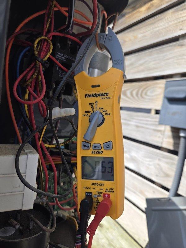 Performed routine cooling maintenance visit on two HVAC systems. Conducted electrical diagnostics using clamp meter, recording amperage draw of 25.3 amps on outdoor unit components. Inspected attic ductwork system and verified proper airflow through supply plenum. All systems operating within normal parameters upon completion of maintenance procedures.
