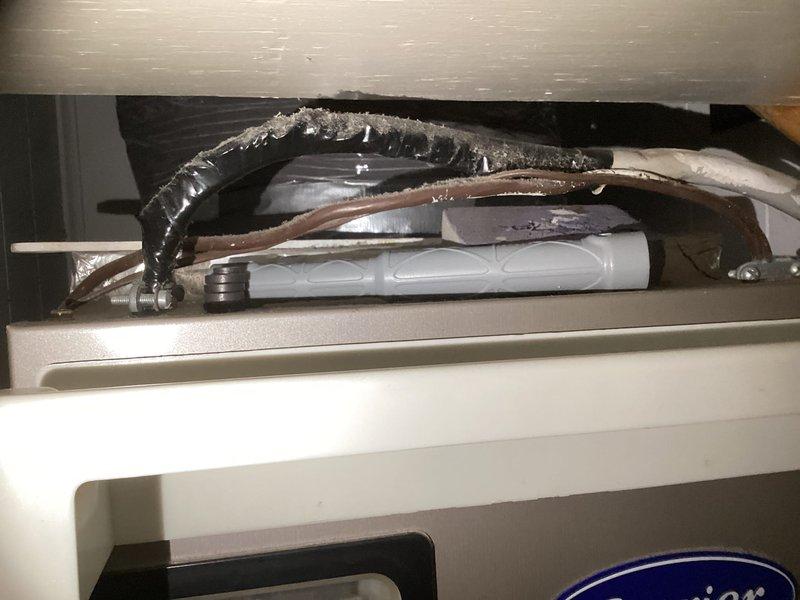 Completed HVAC estimate for replacement of existing Carrier air handler system located in hall closet with outdoor unit in exterior closet. System exhibited significant frost accumulation on refrigerant lines and ductwork, indicating potential refrigerant leak or restriction requiring full system replacement rather than repair.