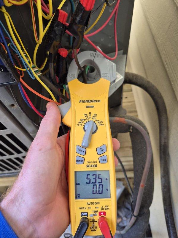 Completed routine cooling maintenance visit on residential HVAC system. Accessed property using key from lockbox, located thermostat behind seagull picture as directed. Performed standard cooling system diagnostics including electrical measurements, recording voltage reading of 344V and amperage draw of 53.5A at the condensing unit. Inspected control wiring, capacitor, and electrical connections within the air handler. All components operating within normal parameters. Customer was not present during service; extra filters noted in foyer closet for future reference.