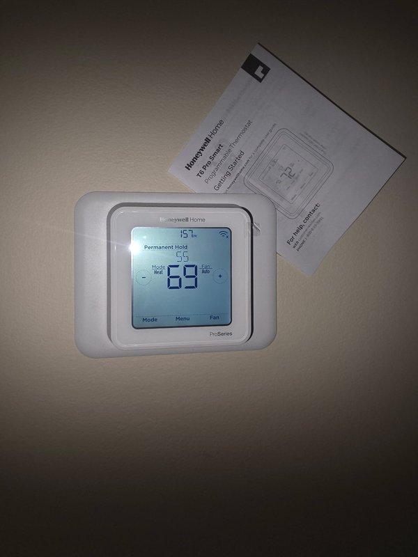 Completed full HVAC system replacement including removal and disposal of existing equipment. Installed 5A6H4030 14 SEER heat pump on outdoor pad with new whip and disconnect. Installed 5TEM6B03 variable speed fan coil unit on new seated plenum with BAYHTR1510BRKR backup heat. Furnished and installed new 20x20 filter return air grille. Mounted and configured Honeywell T6 Pro Wi-Fi thermostat (TH6320WF2003) with system programming. Flushed, pressure tested, and recharged refrigerant lines to manufacturer specifications. Verified all electrical connections, airflow, and system operation. Unit tested and left in proper working condition with extended warranty coverage activated.