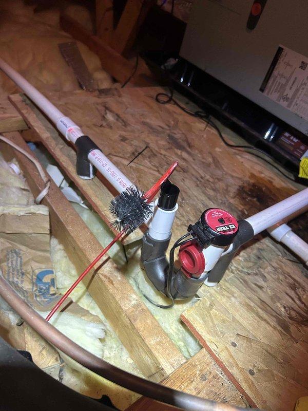 Completed comprehensive inspection of two HVAC systems with cooling performance evaluation. Examined condensate pump assembly and drainage piping in attic space, verifying proper operation and connections. All components found functioning within normal parameters, with systems ready for cooling season operation.