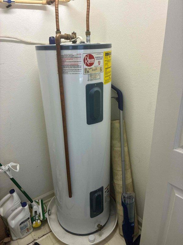 Completed de-winterization of off-season water system, restoring full plumbing functionality to the property. Inspected and documented existing Rheem water heater installation, including all copper supply lines, corrugated flexible connectors, shutoff valves, and electrical connections. Captured detailed photographs of water heater condition and mechanical room setup to provide comprehensive documentation for future water heater replacement estimate.