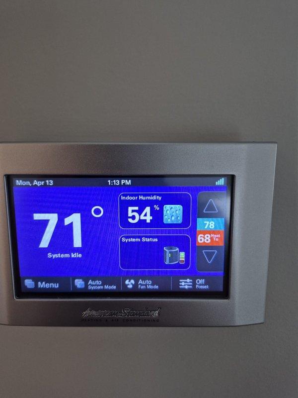 Completed performance tune-up maintenance on two heating systems. Performed comprehensive system diagnostics using digital multimeter to verify electrical components, control board functionality, and proper voltage readings on both units. Inspected all mechanical and electrical connections, tested system operations, and verified American Standard thermostat programming and communication with HVAC equipment. Confirmed indoor humidity levels at 54% and system responding properly to thermostat commands. Both heating systems operating within manufacturer specifications with no issues identified during inspection.
