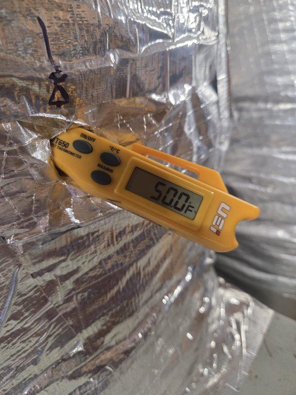 Completed routine cooling maintenance visit on two HVAC systems. Performed system diagnostics using digital multimeter to verify electrical parameters, recording 140VAC operating voltage. Measured supply air temperature at 50.0°F, confirming proper cooling operation and refrigerant charge. Both systems operating within normal specifications with no issues identified.