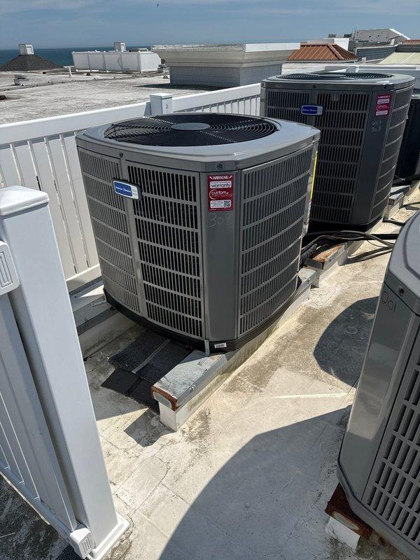 Completed full HVAC system replacement including removal and disposal of existing equipment. Installed American Standard 5A6H4036A1000A 3-ton 14 SEER heat pump condenser on rooftop using crane service, along with American Standard 5TEM4B03AC31 air handler in interior utility closet. Added American Standard BAYHTR1510 10kW electric heat pack and BAYSF1185 18.5" filter rack to air handler assembly. Fabricated and installed metal duct transitions to adapt new equipment to existing ductwork. Reused existing refrigerant lines and condensate drain lines where applicable. Replaced outdoor electrical disconnect and electrical whip to meet current code requirements. Installed Honeywell TH6320WF digital WiFi thermostat for system control. System tested and operational with one-year parts warranty from installation date.