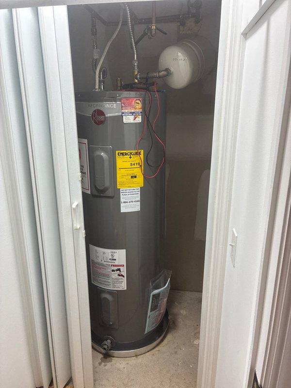 Performed routine maintenance flush on a 50-gallon Rheem electric water heater (Model XE50T06ST45U1, manufactured February 2021). Inspected unit for proper operation, drained and flushed tank to remove sediment buildup, verified all plumbing connections and safety devices including expansion tank, and confirmed unit returned to normal operating condition with customer credit card on file for payment.