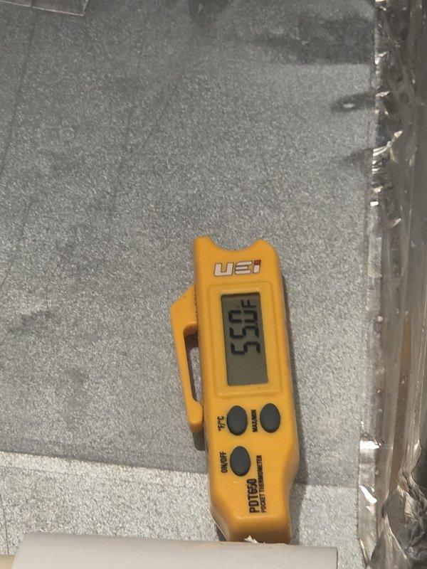 Performed cooling system inspection and maintenance as requested, with heating check deferred per homeowner preference. Conducted diagnostic measurements and system evaluation using calibration equipment, recording temperature readings of 49.5°F at various test points throughout the HVAC system and ductwork to verify proper operation and airflow performance.