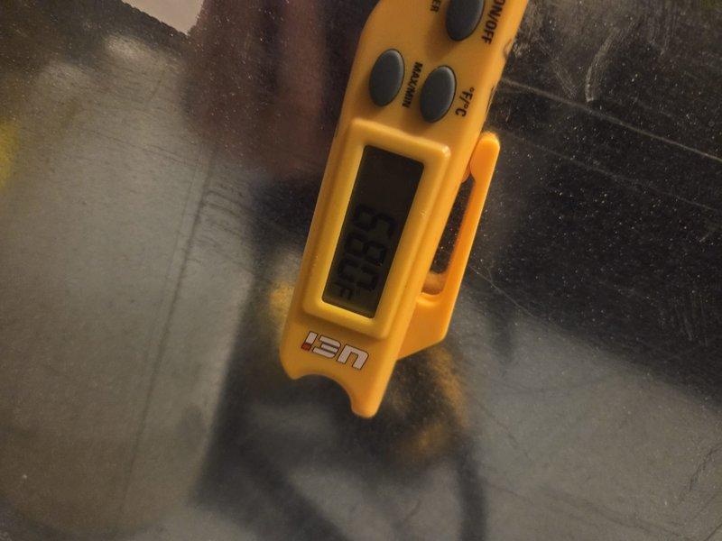 Completed cooling system maintenance inspection and performance verification. Measured and documented system temperatures using calibrated digital thermometer, confirming proper refrigerant charge and heat transfer efficiency. All operational parameters tested within manufacturer specifications, system operating normally with no deficiencies noted.