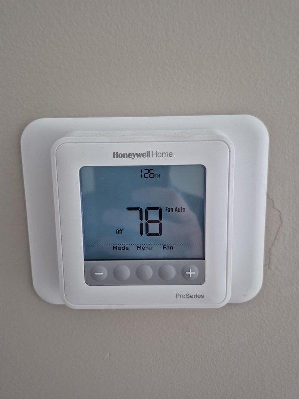 Completed scheduled maintenance inspection on two cooling systems. Verified proper thermostat operation on both Honeywell Home ProSeries units, confirmed accurate temperature readings and system response. Performed comprehensive system checks including refrigerant levels, electrical connections, condensate drainage, and airflow measurements. Both systems operating within manufacturer specifications with no deficiencies noted.