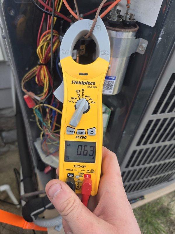 Completed routine cooling maintenance visit on two HVAC systems. Performed diagnostic testing using digital instruments to verify electrical parameters, measured capacitance readings at 0.63, and inspected system components including capacitors, wiring connections, and control circuits to ensure proper operation for the cooling season.