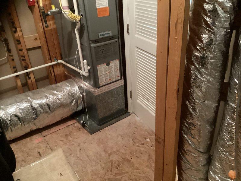 Evaluated 20-year-old furnace system located in upstairs closet for repair versus replacement options after inducer motor failure was identified. Conducted comprehensive assessment of unit condition, documented equipment with photos, and provided repair estimate for inducer motor replacement with part available in stock.