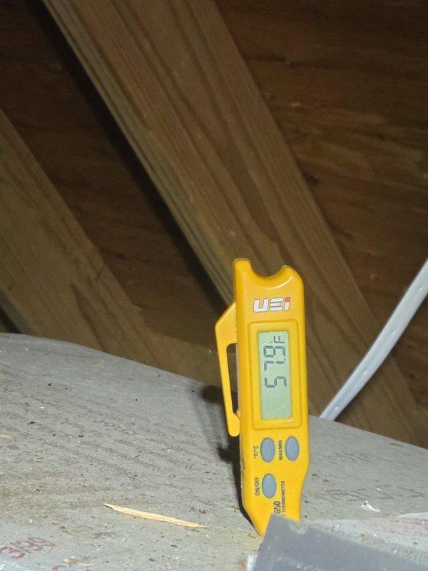 Performed routine cooling maintenance visit on multi-system HVAC installation. Conducted temperature and diagnostic measurements using digital testing equipment in attic space to verify proper system operation and performance across all cooling units. All systems found to be operating within normal parameters.