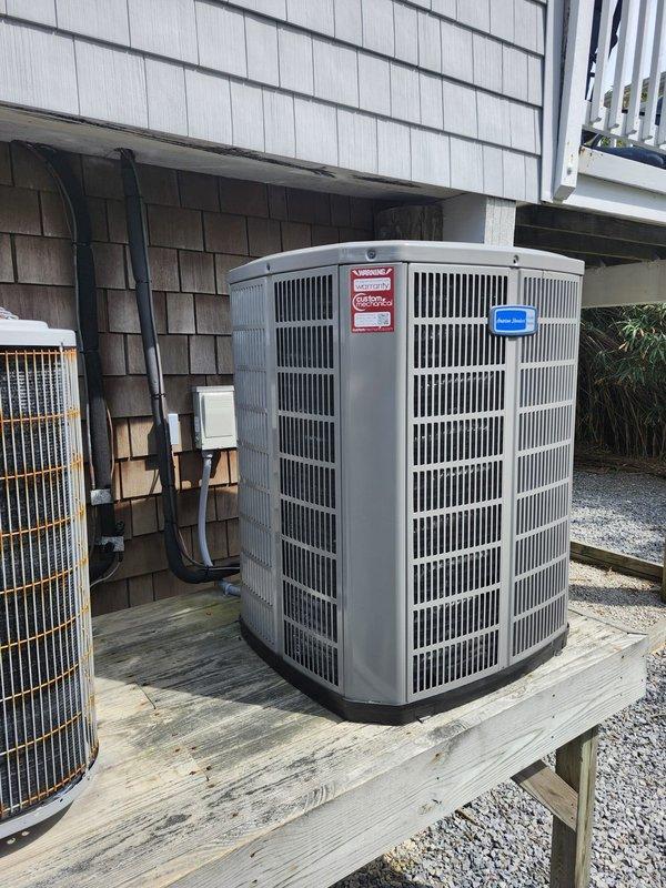Completed full HVAC system replacement for second floor of residence. Removed and disposed of existing equipment, then installed 5A6H7024 2-ton 17 SEER heat pump outdoor unit on existing stand with new whip and disconnect. Installed 5TEM6B02 variable speed fan coil unit in drain pan with shut-off valve in attic space, complete with 10KW heater and breaker. Flushed, pressure tested, and recharged refrigeration lines to manufacturer specifications. Installed TH6320WF WiFi thermostat for system control. All equipment tested and operational upon completion. One-year extended warranty applied to both systems in home.