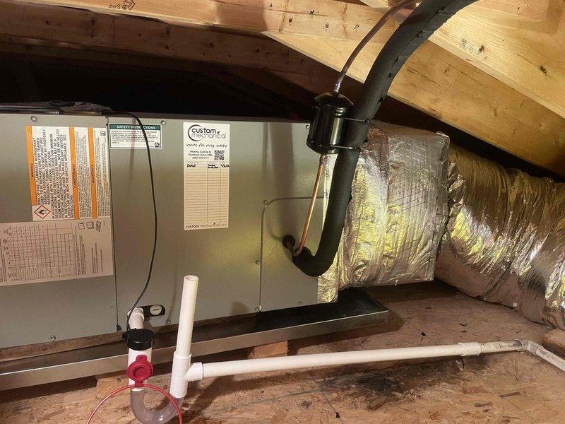 Completed full HVAC system replacement for second floor of residence. Removed and disposed of existing equipment, then installed 5A6H7024 2-ton 17 SEER heat pump outdoor unit on existing stand with new whip and disconnect. Installed 5TEM6B02 variable speed fan coil unit in drain pan with shut-off valve in attic space, complete with 10KW heater and breaker. Flushed, pressure tested, and recharged refrigeration lines to manufacturer specifications. Installed TH6320WF WiFi thermostat for system control. All equipment tested and operational upon completion. One-year extended warranty applied to both systems in home.