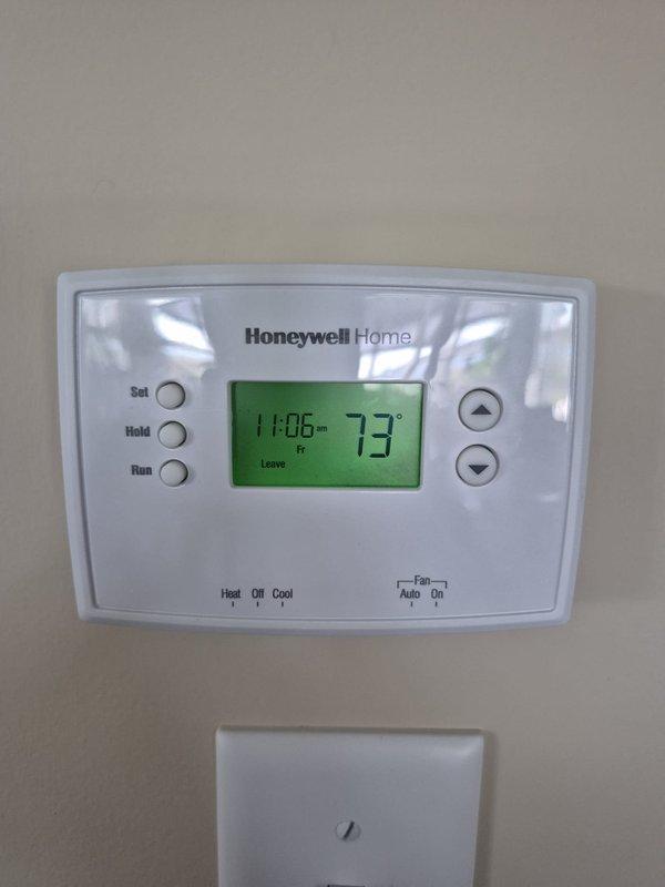 Completed platinum membership maintenance service on two cooling systems. Performed comprehensive inspection of both outdoor condensing units, including electrical testing with digital multimeter to verify proper voltage and amperage readings. Checked refrigerant pressures, cleaned condenser coils, inspected electrical connections, and verified proper operation of compressors and fan motors. Tested thermostat functionality and confirmed accurate temperature control and programming settings at 73°F. Both systems operating within manufacturer specifications with no deficiencies noted at time of service.