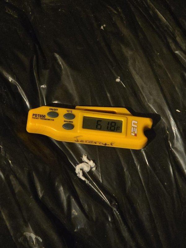Performed comprehensive cooling system inspection and maintenance on HVAC unit. Conducted operational diagnostics using digital thermometer and clamp meter, measuring system temperatures and electrical parameters to verify proper performance. Return air temperature recorded at 61.8°F, with electrical readings at 498 on the multimeter indicating normal amperage draw. Inspected all electrical connections, wiring, and blower assembly within the air handler unit. Additionally, performed tankless water heater maintenance including system flush to remove mineral buildup and ensure optimal efficiency.