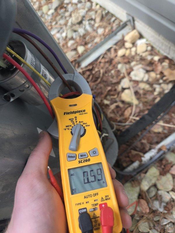 Completed routine cooling maintenance visit on residential HVAC system. Performed diagnostic measurements including capacitor testing with clamp meter showing 0.59 reading and airflow/temperature measurements at ductwork registering 5.08. Inspected condensing unit electrical connections, evaluated insulated supply ductwork for proper airflow distribution, and verified system operation. System found operating within normal parameters with no repairs required at this time.