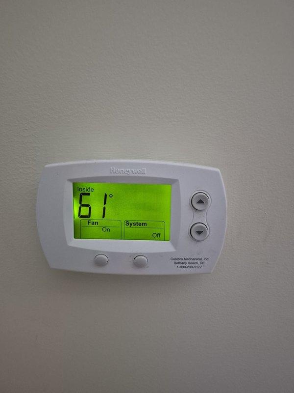 Completed cooling maintenance on five HVAC systems at commercial property. Accessed multiple units through attic crawl space using ladder access point. Verified thermostat operations, confirmed system settings, and documented equipment conditions with digital photographs for maintenance records.