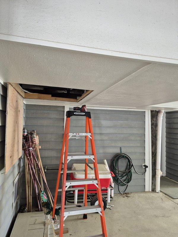 Completed cooling maintenance on five HVAC systems at commercial property. Accessed multiple units through attic crawl space using ladder access point. Verified thermostat operations, confirmed system settings, and documented equipment conditions with digital photographs for maintenance records.