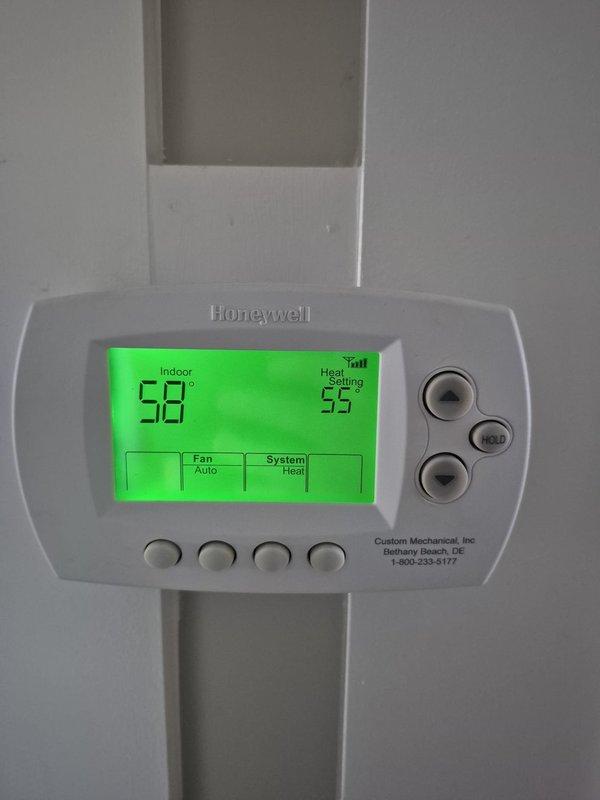 Completed routine cooling system maintenance visit. Verified thermostat operation and calibration, with unit displaying proper temperature readings and system controls functioning correctly. Performed electrical diagnostics using clamp meter to measure amperage draw and system performance, confirming all electrical components including capacitor are operating within manufacturer specifications.