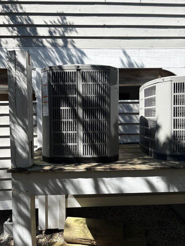 Completed full HVAC system replacement involving removal and disposal of existing equipment. Installed American Standard 5A6H4018A1000 1.5-ton 14 SEER heat pump with matching 5TEM4B02CAC21 air handler, BAYHTR1510 10kw electric heat pack, BAYSF1185 18.5" filter rack, and Honeywell digital thermostat. Fabricated and installed metal duct transitions to adapt new equipment to existing ductwork. Reused existing condensate drain lines while replacing outdoor disconnect and electrical whip to current code standards. Positioned outdoor condensing unit on existing elevated wooden platform alongside previously installed system. All refrigerant lines properly connected and tested for leaks. System commissioned, tested for proper operation, and left in full working order.