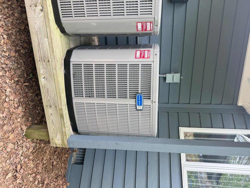 Completed full HVAC system replacement including removal and disposal of existing equipment. Installed 3-ton 14.3 SEER heat pump outdoor unit (model 5A6H4036) on existing stand and standard fan coil unit with 15KW electric heater and breaker (model 5TEM4B03) on existing wood platform in garage. Mounted Honeywell T-6 WiFi thermostat (model TH6320WF2003) for system control. Flushed, pressure tested, and recharged refrigeration lines to manufacturer specifications. System tested and verified operational with one-year extended warranty coverage from installation date.